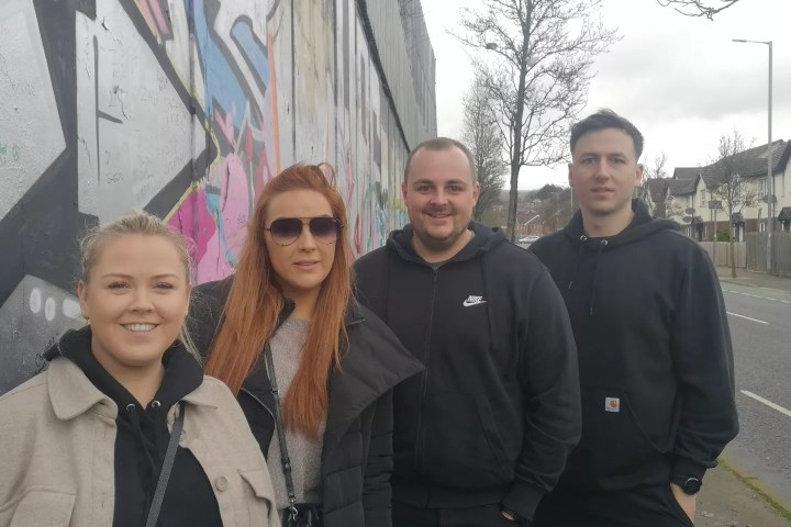 a group of people posing for a photo