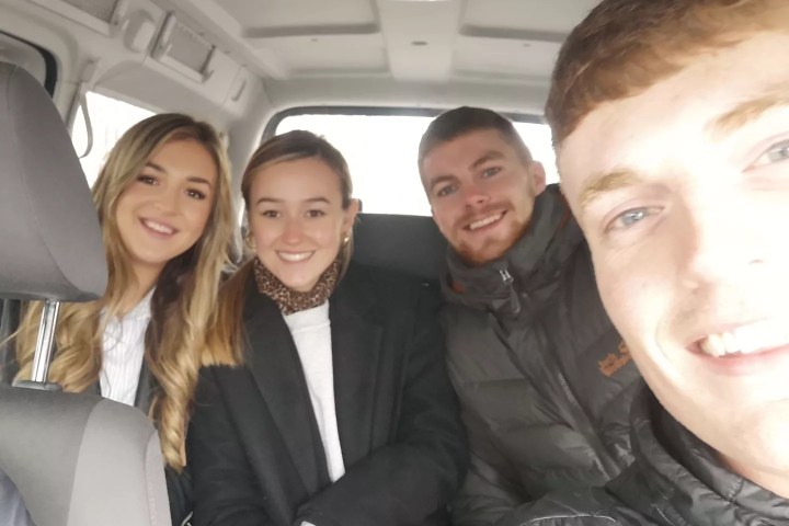 a group of people posing for the camera