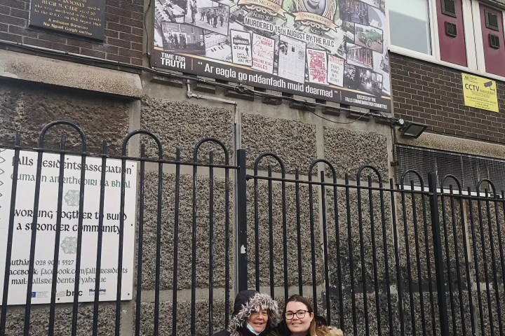 a person standing in front of a building