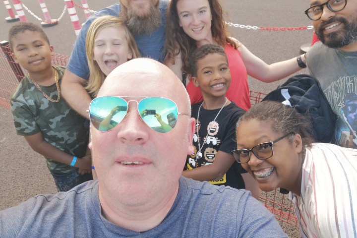 a group of people posing for the camera