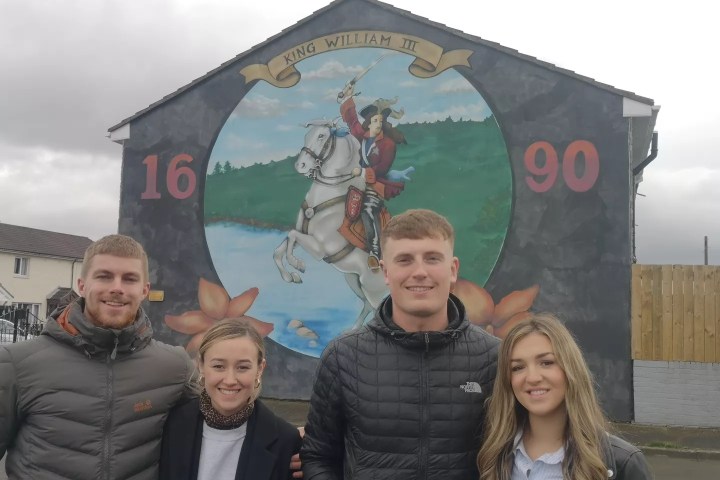 Chloe Lamb et al. posing for a photo