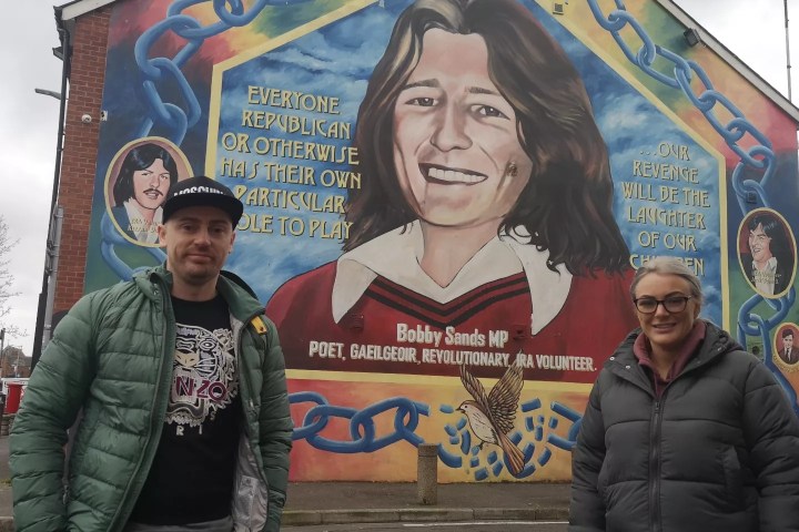 a person standing in front of Kieran Doherty, Bobby Sands posing for the camera